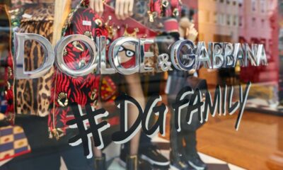 Close up of Dolce & Gabbana signage in a window of a store, representing the Dolce & Gabbana class action.