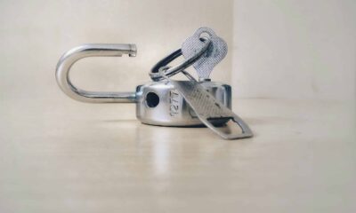 A metal silver lock getting unlocked